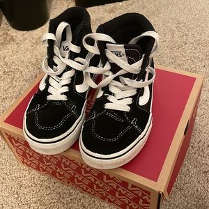 Toddler sized 11.5 black/white vans